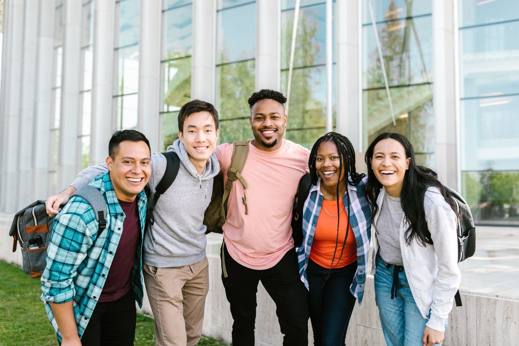 A group of students outside a university building